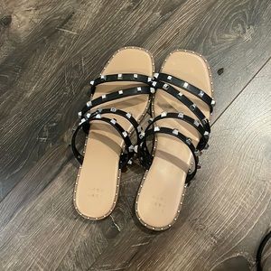 Studded black sandals